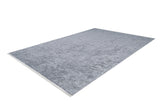 The Bohemian Driftwood - Washable Rug (JR1951) is a rectangular, light gray rug with a subtle textured pattern, shown angled on a white background—ideal for high-traffic spaces.