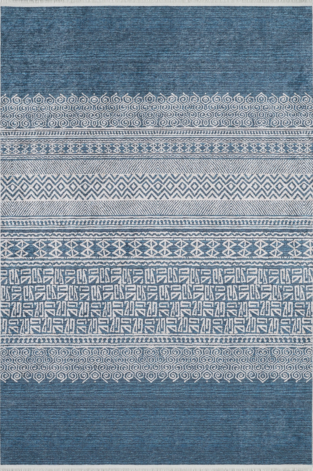 The Bohemian Retreat - Washable Rug - JR1589 showcases blue and white geometric and swirl patterns in symmetrical rows, offering decorative style and easy cleaning—ideal for high-traffic spaces.