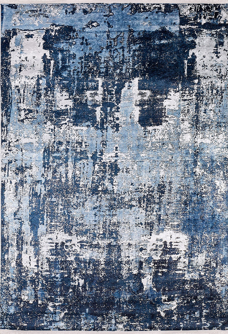 The Bold Blooms - Washable Rug - JR836 features a distressed, textured pattern in blue, white, and black for an artistic look. Perfect for high-traffic areas, this modern washable rug adds style with its unique abstract design.