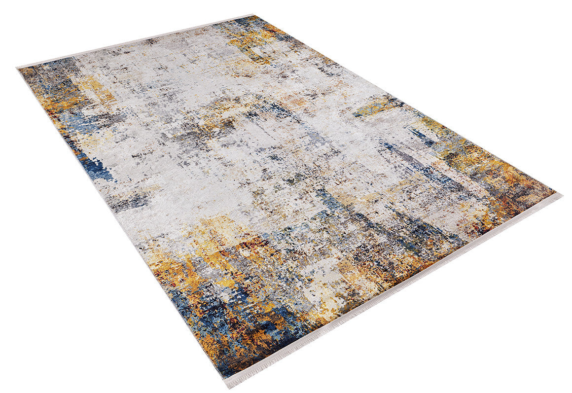 The Chromatic Kaleidoscope - Washable Rug - JR1483 features an abstract pattern in white, blue, yellow, and gray, offering a practical, stylish choice for high-traffic areas. Displayed on a white background.