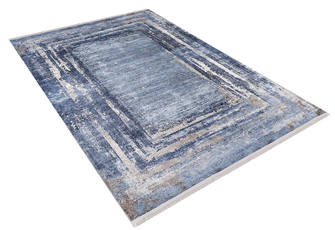 The Classic Bordered - Washable Rug - JR1197 is a rectangular rug with a modern blue, gray, and beige design. It features layered rectangles, distressed details, and short fringes—perfect for high-traffic spaces.