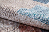 A close-up of the Classic Check - Washable Rug - JR1955 shows its soft, textured surface with beige, blue, and brown rectangular patterns. The washable design is perfect for high-traffic or allergy-sensitive homes.