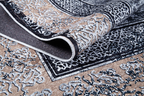 Load image 1 in gallery view. A close-up of the Contemporary Borderline - Washable Rug - JR1798 reveals its ornate beige and black flat weave, a folded corner highlighting intricate textures—an allergy-friendly, stylish addition perfect for any space.