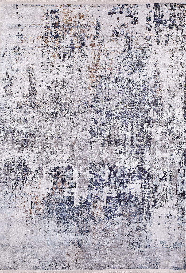 The Creative Currents - Washable Rug - JR835 features a modern flat weave with a distressed pattern in gray, blue, and beige. Durable for high-traffic spaces, its design has scattered patches and speckles for a stylish, weathered look.