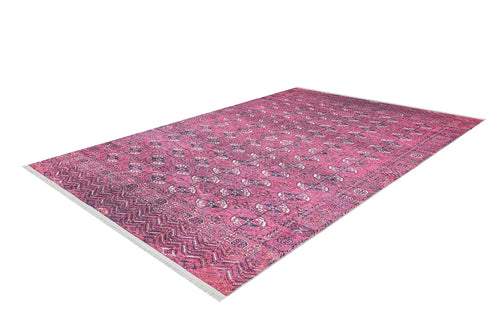 Load image 1 in gallery view. The Desert Dreamscape - Washable Rug - JR1940 is a rectangular, soft pink rug with geometric and floral patterns, shown angled on a white background. It features white fringe on the short edges and combines style with easy, everyday practicality.