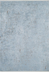 Earthy Sands - Washable Rug - JR1819 features a light blue textured surface with gray and beige speckles and streaks, creating a weathered, abstract look—perfect for high-traffic areas.