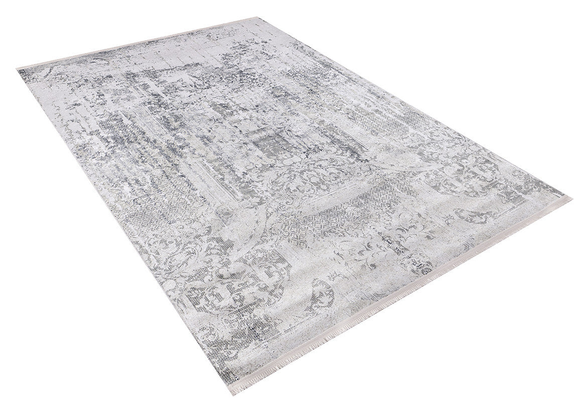 The Faint Memories - Washable Rug - JR1437 is a large rectangular anthracite-gray rug featuring a distressed vintage pattern in gray and white. Stylish and durable, it's the perfect practical accent for any space.