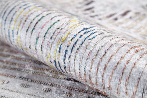 Load image 1 in gallery view. A close-up of the Gypsy Glam - Washable Rug (JR1716) shows its soft, textured surface with curved, multicolored lines on a light background—ideal for high-traffic spaces.