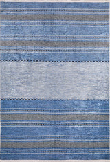 The Layered Lines - Washable Rug - JR1545 is a rectangular blue rug with horizontal stripes in blue and gray, featuring diamond and zigzag patterns—durable for high-traffic areas and easy to clean as it’s fully washable.