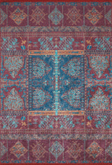 The Majestic Mandarin - Washable Rug (JR1863) features a Persian-style, ornate blue, red, orange, and teal symmetrical pattern with floral and geometric motifs, intricate borders, a central medallion, and is ideal for high-traffic areas.