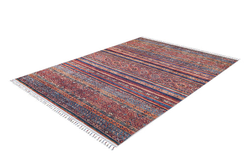 Load image 1 in gallery view. The Native Nightscape - Washable Rug (JR5093) features a colorful rectangular design with intricate geometric patterns, horizontal stripes in red, blue, orange, and beige, and fringed edges—ideal for high-traffic spaces.