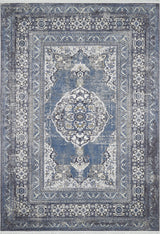 The Opulent Beauty - Washable Rug - JR1932 features a blue, white, and gray distressed medallion design with intricate florals and decorative borders. Its vintage look is perfect for high-traffic spaces and easy to maintain.