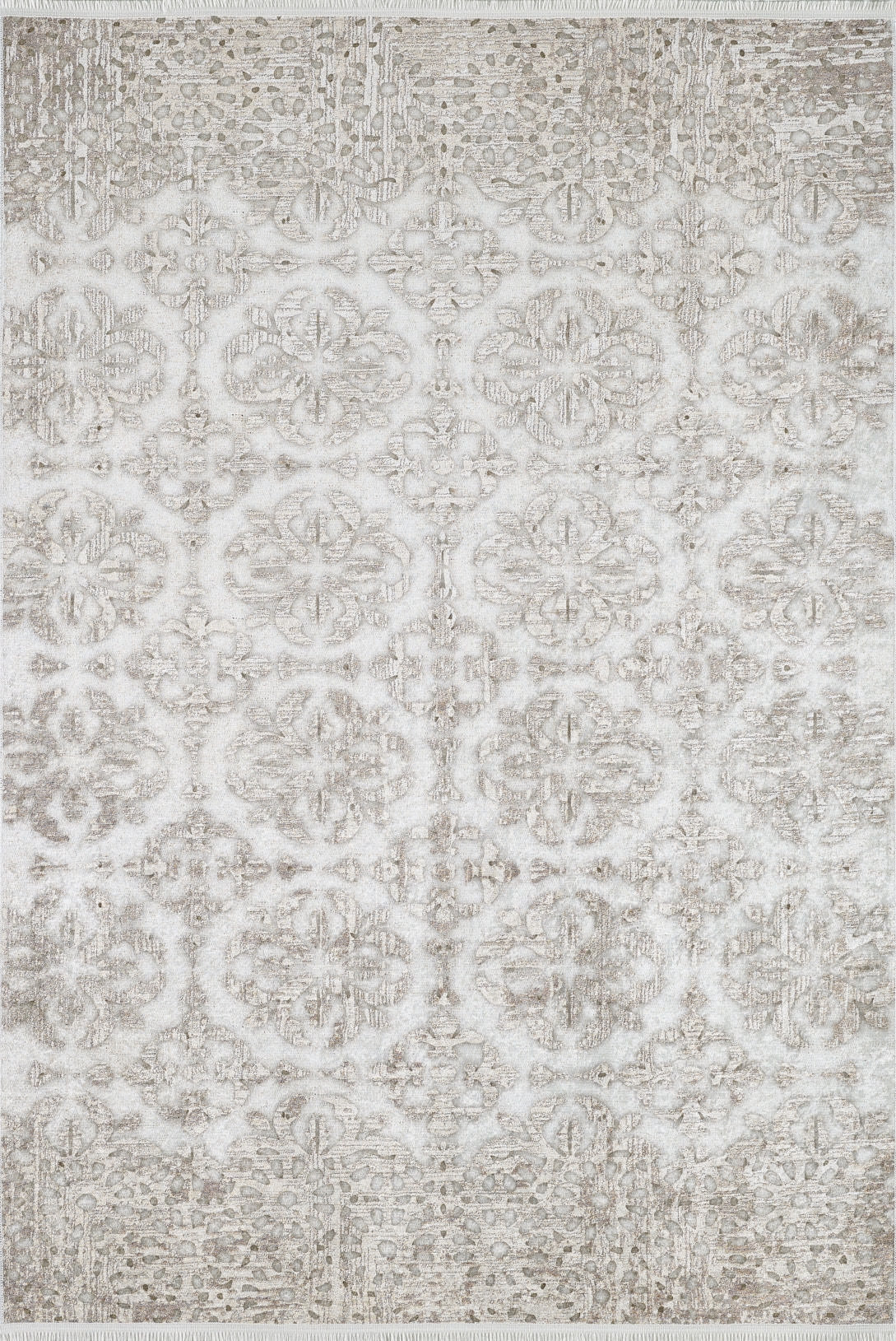 The Regal Embellishment - Washable Rug (JR1590) is a rectangular flat weave rug with light grey and beige tones, showcasing an ornate symmetrical pattern with intricate, faded floral and geometric designs.