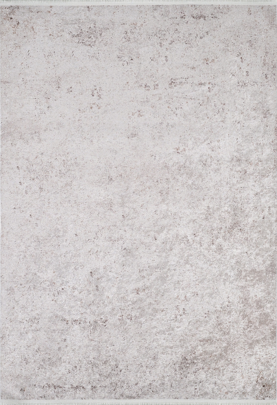 The Rustic Trails - Washable Rug - JR1736 is a large, rectangular light gray rug featuring a subtle mottled texture and minimal pattern, ideal for high-traffic areas while adding a soft, neutral touch to your space.