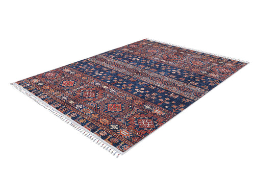 Load image 1 in gallery view. The Sahara Sunrise - Washable Rug - JR5091 is a rectangular Persian-style rug with intricate red, blue, and white geometric patterns and fringed short edges. Perfect for high-traffic areas, it sits flat on a white background.