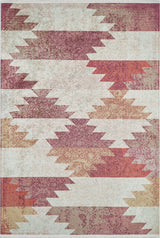 The Simplistic Artistry - Washable Rug - JR1647 features a red base with orange, yellow, and cream zigzag and geometric shapes in a vintage-style distressed texture. It's perfect for high-traffic areas, combining style with easy care.
