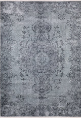 The Sophisticated Design - Washable Rug - JR173 is a rectangular flat weave rug featuring a faded vintage floral and medallion pattern in gray and black, offering an intricate, distressed antique look.
