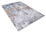 The Striking Statements - Washable Rug - JR786 features a rectangular, multicolor abstract design in blue, grey, white, and brown with pixelated textures for a modern look. Easy to maintain and artistically styled, shown on a white background.