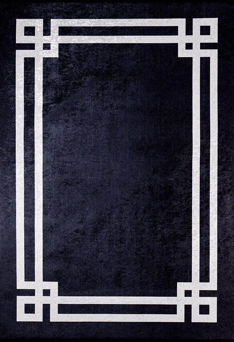 The Subtle Border - Washable Rug - JR597 is a dark black rug with a simple geometric border of double white lines forming right angles at the corners, creating a modern, symmetrical frame—perfect for high-traffic areas.