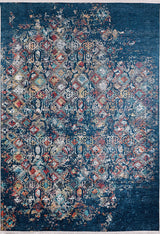 The Tarnished Elegance - Washable Rug - JR1095 is a rectangular, washable rug featuring a faded blue, red, yellow, and cream distressed pattern with symmetrical floral motifs—ideal for adding vintage flair to high-traffic spaces.