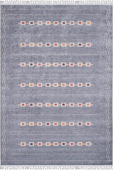 The Tuscan Villa - Washable Rug - JR5058 is a rectangular gray-anthracite rug with cream fringe edges and rows of small muted red, yellow, and brown squares. It’s designed for high-traffic areas and easy machine washing.