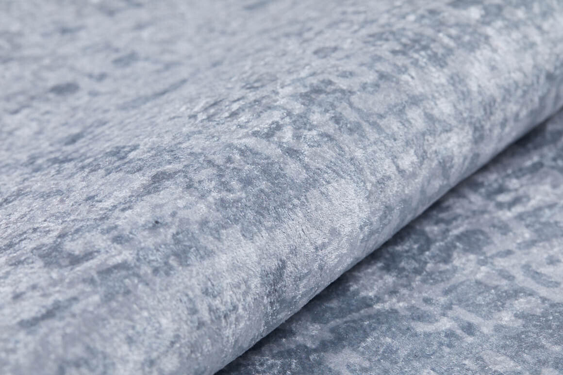 Close-up of Twilight Sky - Washable Rug - JR856 featuring soft, light gray crushed velvet with a textured, slightly shiny surface—an elegant and comfortable addition to any space.