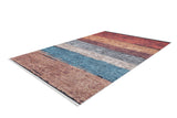 The Urban Edge - Washable Rug - JR2005 is a multicolor flat weave area rug with horizontal stripes in rust, blue, gray, and brown. It features a textured, distressed pattern and fringed edges, shown on a white background.