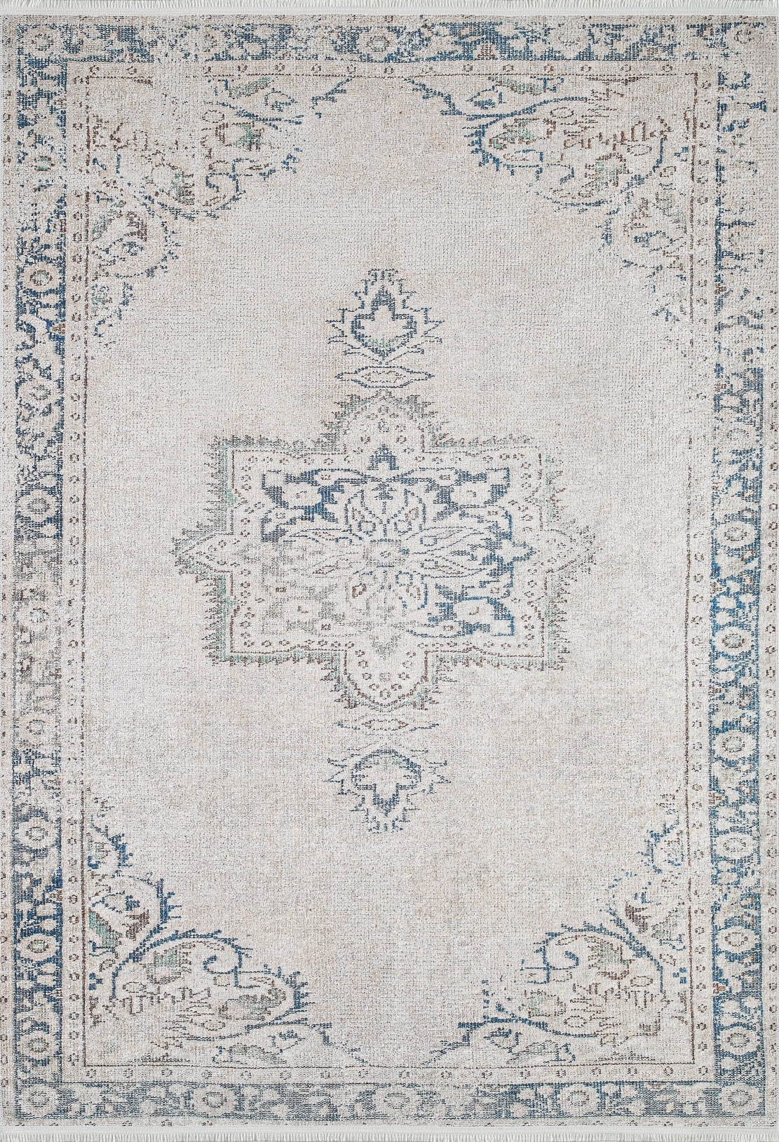 The Vintage Beauty - Washable Rug - JR1688 features a rectangular, light beige background with a faded blue and gray ornate medallion, floral corners, and a decorative border. Its vintage distressed look is perfect for high-traffic spaces.