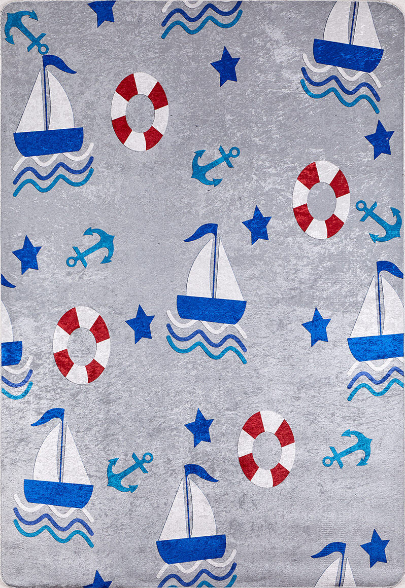 The WaveVenture - Machine-Washable Rug JRC087 is a gray rug with blue sailboats, red and white lifebuoys, blue anchors, and stars in a nautical pattern—durable and ideal for high-traffic areas.