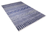 The Wavy Wonders - Washable Rug - JR941 features a blue and white geometric design with stripes, diamonds, and zigzags. Shown laid flat on a white background, it’s perfect for high-traffic areas.