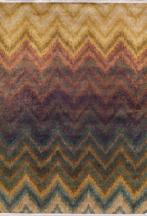 Load image 1 in gallery view. The Zigzag Runway - Washable Rug - JR388 features a textured chevron pattern in earthy zigzag stripes—yellow, gold, brown, burgundy, green, and blue—that blend from light to dark shades, ideal for high-traffic areas.