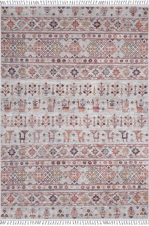 Load image 1 in gallery view. The Nomad's Nest - Washable Rug - JR5088 features a light gray base with vibrant geometric, floral, animal, and tree motifs in red, orange, blue, and gold. It’s ideal for high-traffic areas and finished with fringe on both ends.