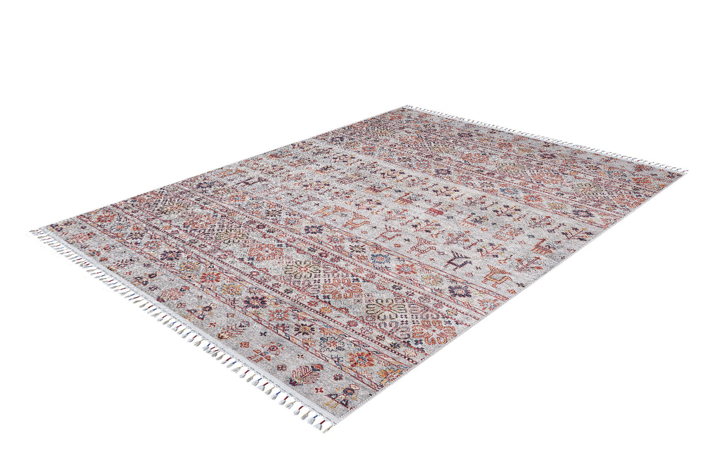 The Nomad's Nest - Washable Rug - JR5088 features detailed geometric and floral patterns in red, orange, and blue on a cream base with white fringe. Allergy-friendly and durable, it’s ideal for busy homes. Shown on a white surface.